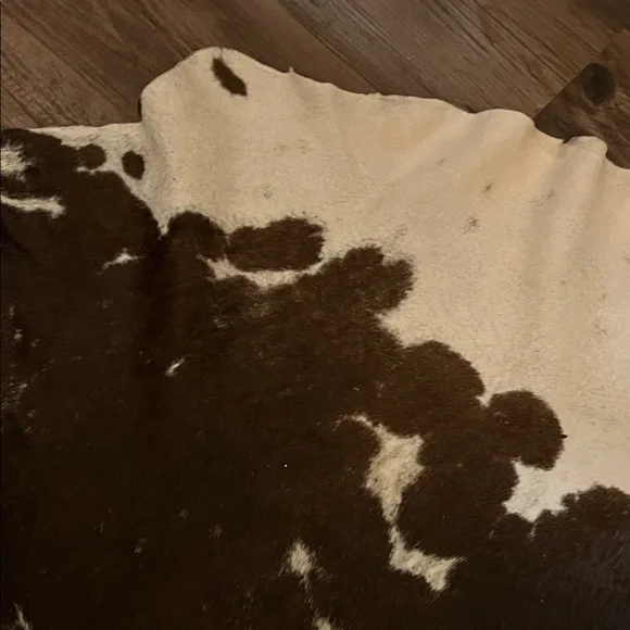 Authentic Cowhide Rug in Brown, Black, and White - Picture 7 of 8